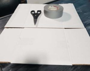 supplies needed to make custom drawer inserts: cardboard, scissors, and duct tape