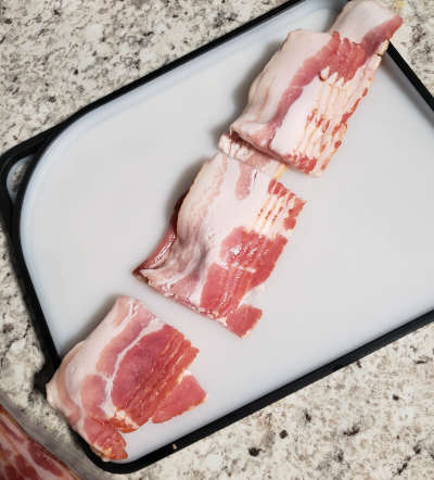cut bacon strips into thirds before wrapping around cocktail weenies